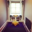 Treatment room to rent in Leeds LS6 for Thai Massage therapist with modern contemporary decor and hanging plants