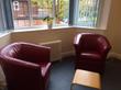 Talking therapy room to rent in South Manchester, Didsbury M20 with two maroon armchairs
