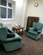 Individual therapy room to rent for one on one work in Edgeley Stockport, SK3 with teal turquoise armchairs