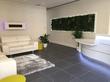 Cryotherapy centre Reception area in High Street Kensington, London W8  with white sofas & treatment rooms rent
