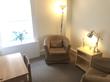 Counselling space to rent in Marylebone Lane, London, W1U with armchairs, a desk & window