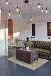 Kings Heath salon waiting area in Birmingham with contemporary interior design & urban boho lighting & decor