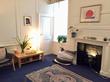 Bristol therapy room to rent with cosy homely feel, cozy fireplace and contemporary interior design