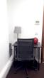 Small table or desk and swivel office chair in corner of London Therapy Room near Bank tube station EC2R