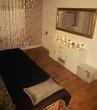 Stylish Hammersmith Treatment room to rent with beauty couch or massage table, beautiful plush gold decor & lovely mirror