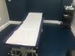 Treatment room to rent in Hove clinic, East Sussex BN3, with hydraulic couch for sports massage therapy, PT & Rehabilitation