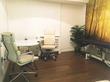 Manchester Consulting room to rent in Bridge Street with consultation desk, office chairs & treatment table bed for clinic examination or body work