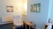 Therapy room to rent in Wigan Town Centre WN1 with baby blue walls & white hypnotherapy chairs for hynotherapist, therapist or psychotherapist work