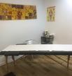 Manchester Massage Room to rent in South Manchester Health Shop M21 with treatment table & wood floor