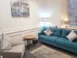 London Counselling Therapy Room to Rent in City Centre near Bank Tube, with a large sofa, armchair and a welcoming contemporary feel